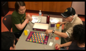 Image of people playing board games